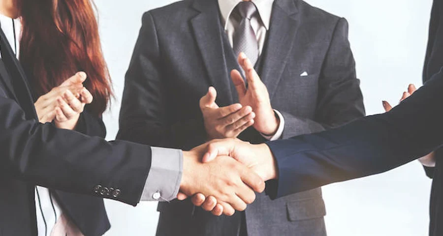 business people shaking hands