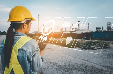 Asian Business Woman with safety hard hat with touches icons Show visual Screen sign of the top service Quality assurance, Guarantee, Standards, ISO certification and standardization concept.