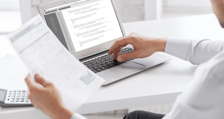 Person entering a document into an electronic Chain of Custody (eCCF) platform.