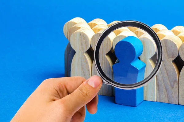 employee background checks magnifying glass searching for employee
