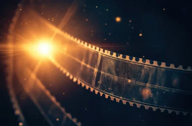 film reel with orange light burst
