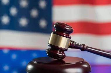 law gavel in front of the American flag