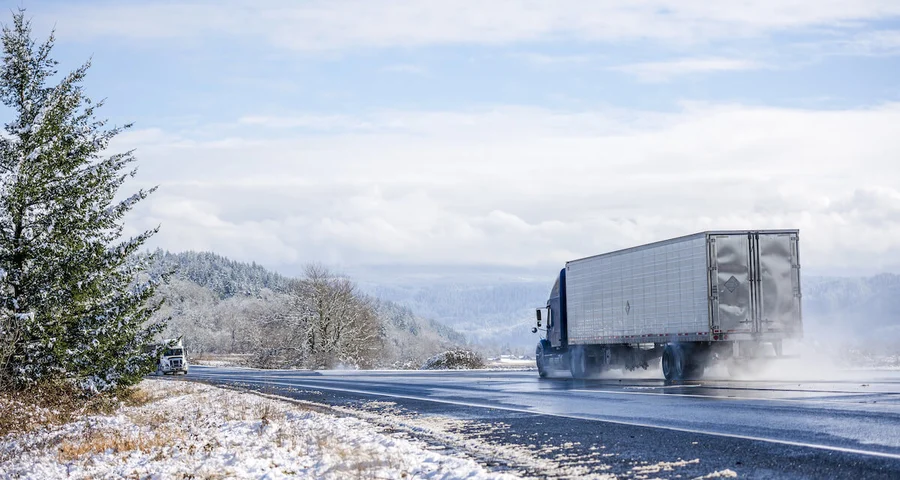 Truck driving on an icy road