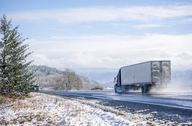 Truck driving on an icy road