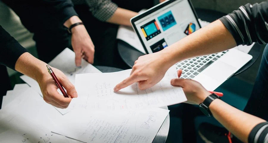 people reviewing documents