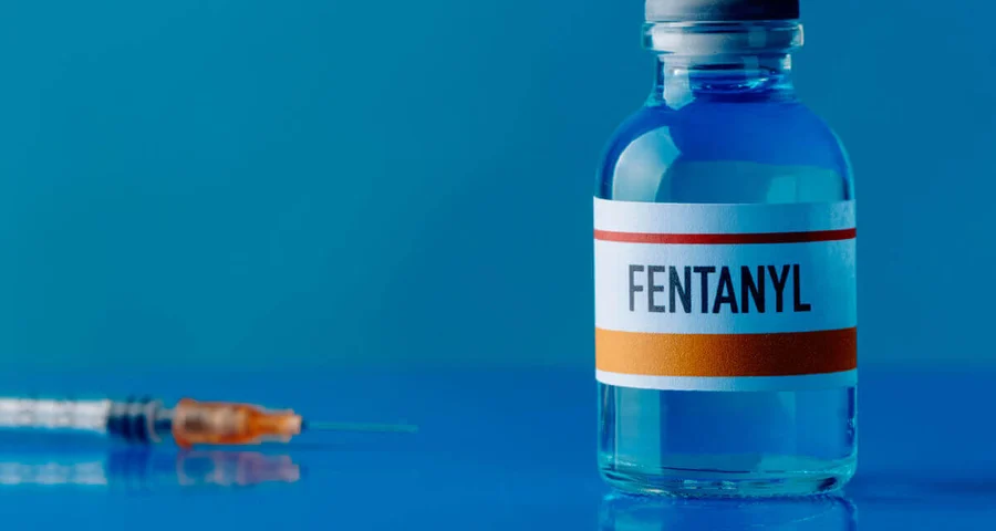 bottle of fentanyl and injection needle