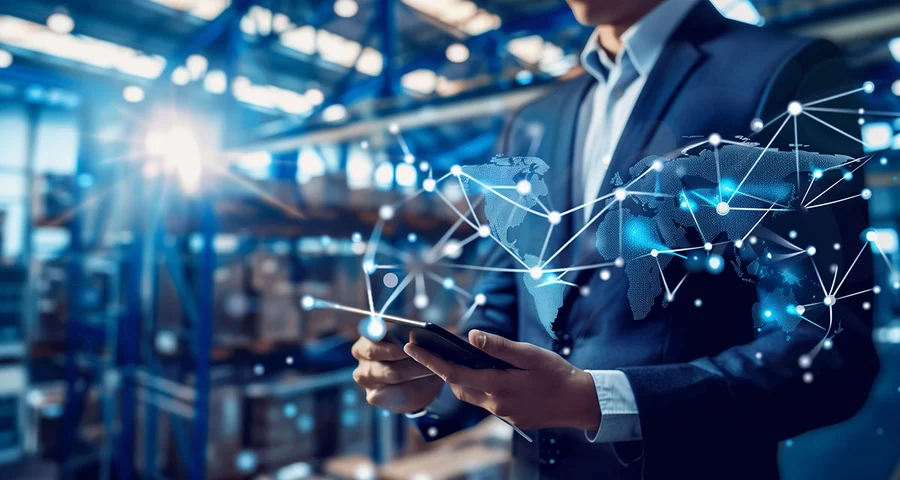business man touching a floating representation of technology