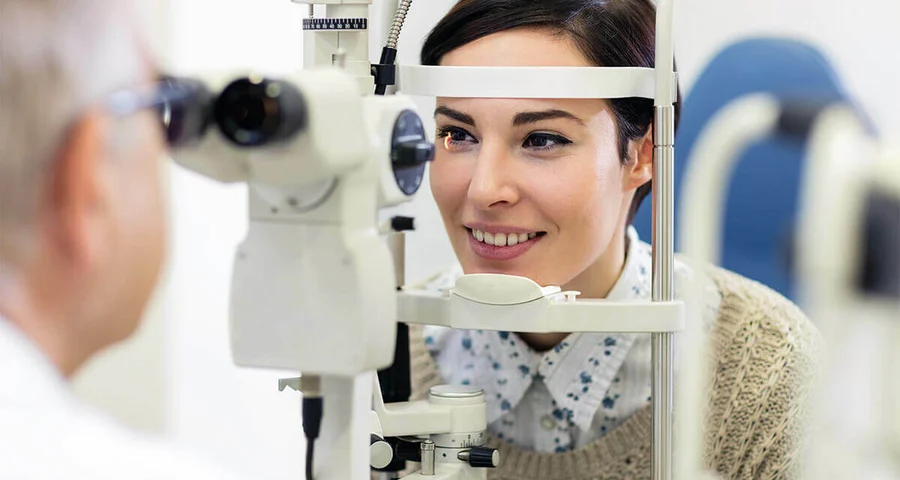 Worker completing a DOT physical eye exam