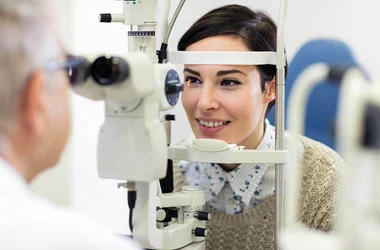 Worker completing a DOT physical eye exam