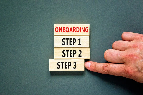 person pointing at onboarding steps 1, 2, and 3