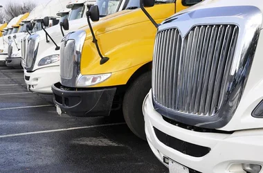 big rig truck front ends lined up