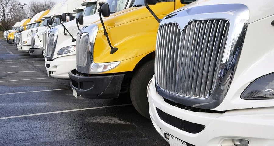 big rig truck front ends lined up