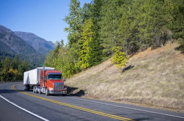 Transportation truck on a mountain road