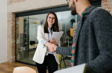 Recruiter and Candidate shaking hands, HR