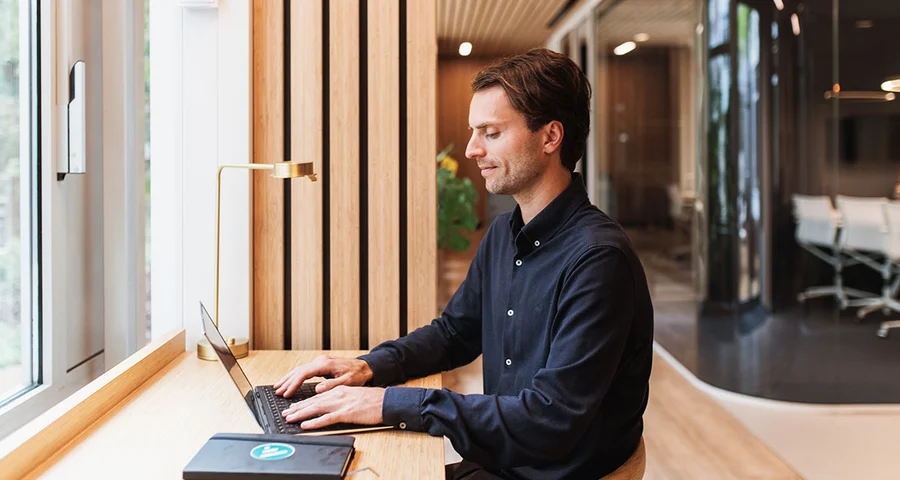 employee working on laptop