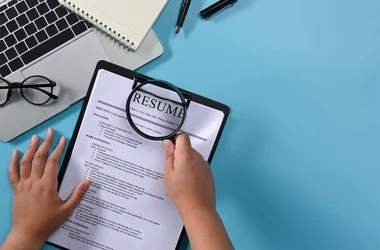 employee background check magnifying resume