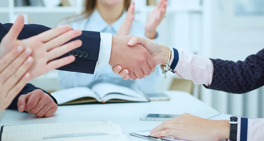 business acquisition business handshake
