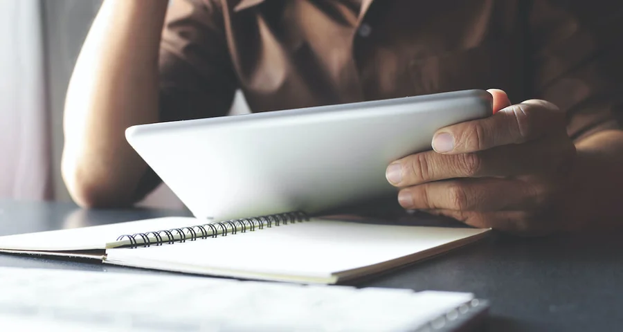 person reading on tablet
