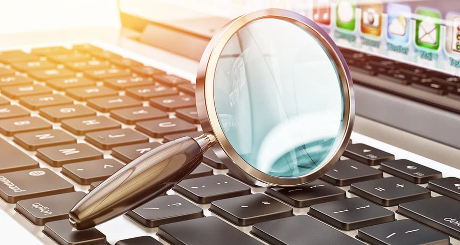 Magnifying glass on keyboard