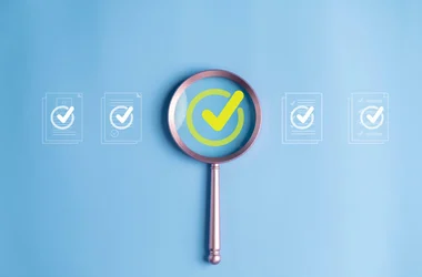background checks magnifying glass with check marks