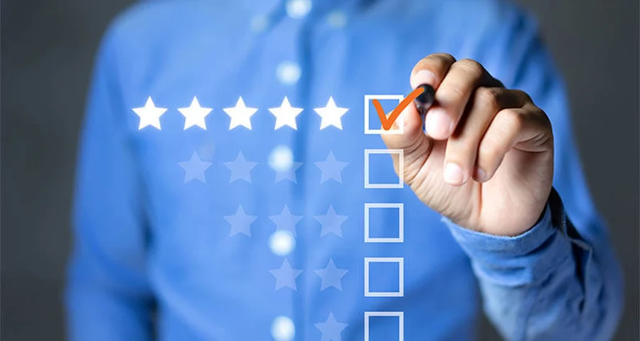 business professional marking off a checklist 5 star rating