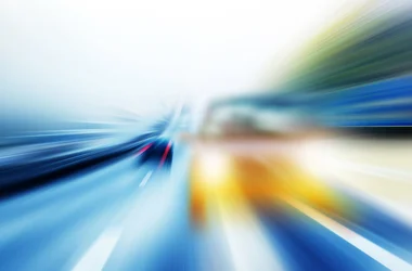 blurred roadway from the point of view of a driver