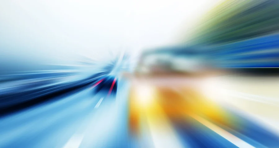 blurred roadway from the point of view of a driver