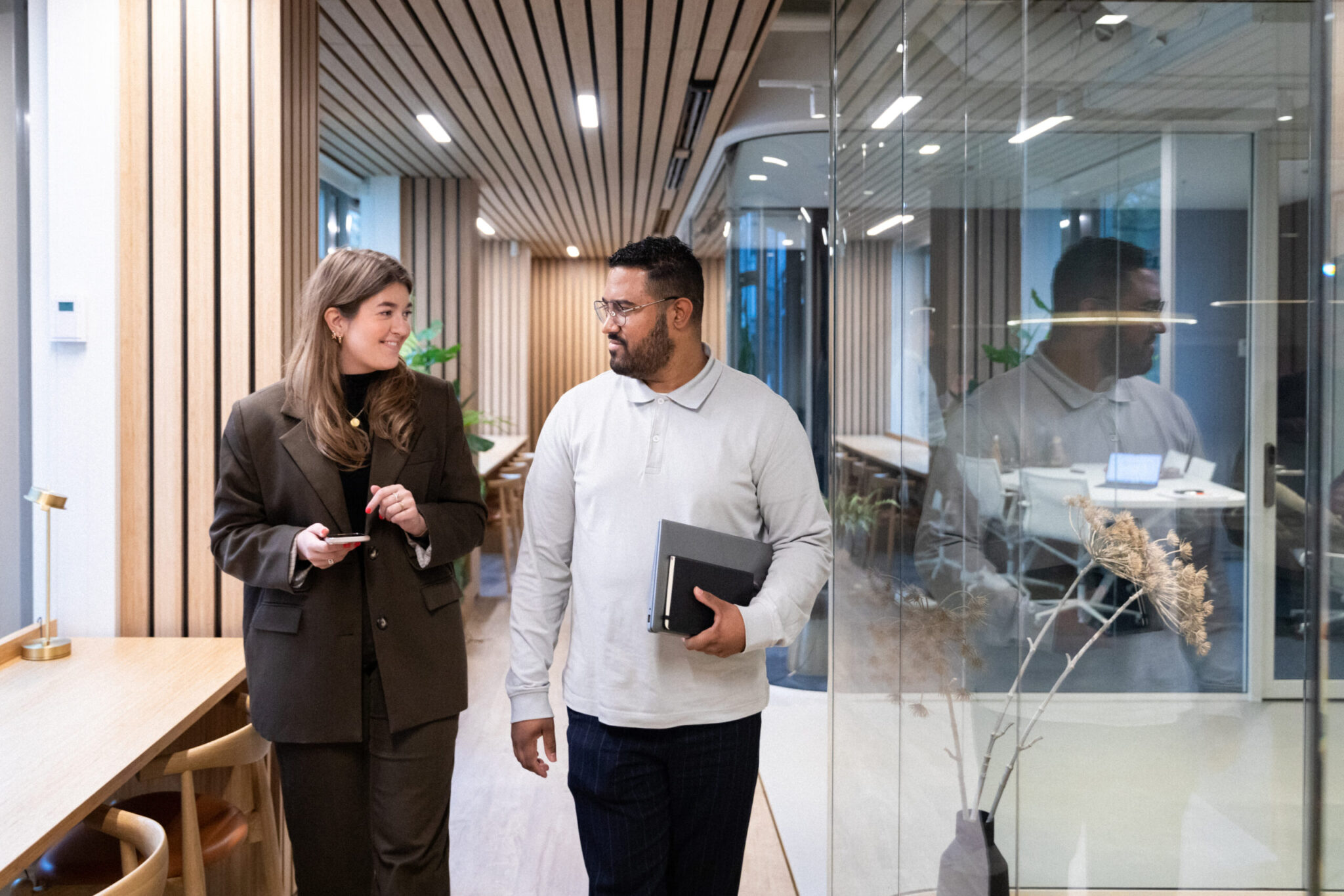 two employees chatting in the office