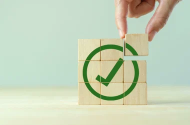 legal compliance wooden block check mark