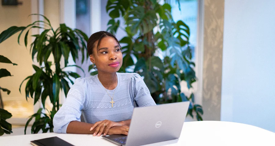 An employee is sitting at the computer, wondering how long a background check takes