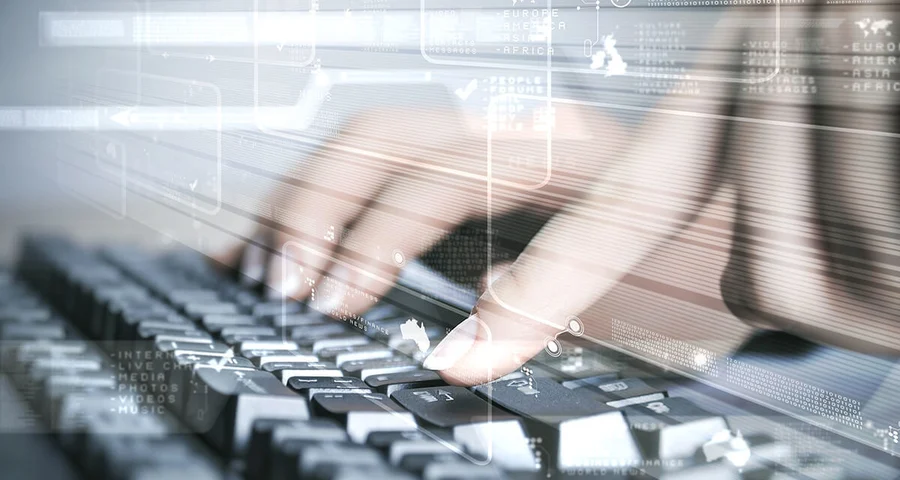 Fingers on a keyboard entering data into DISAWorks 2.0