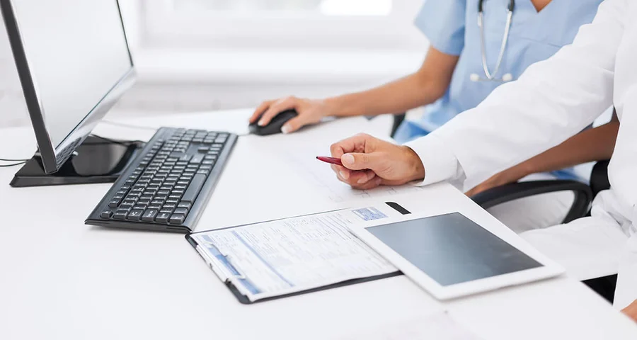 two people viewing eCCF electronic forms