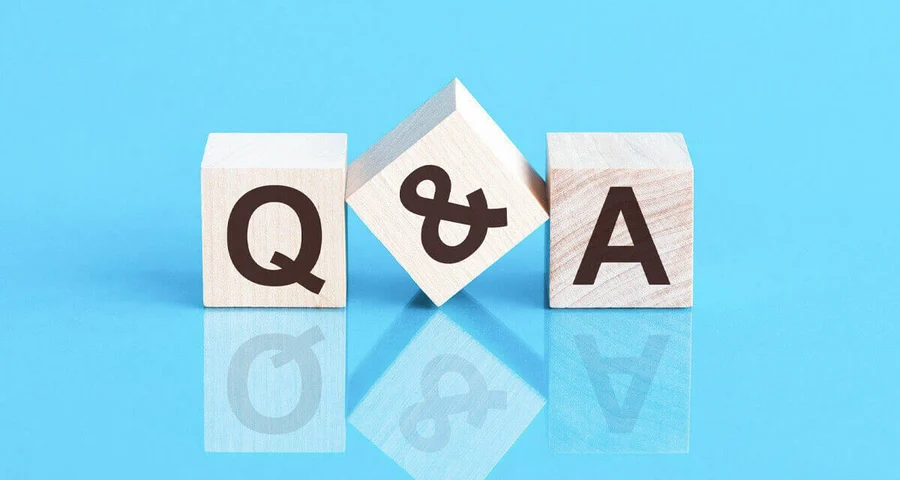 wooden blocks with the letters Q & A