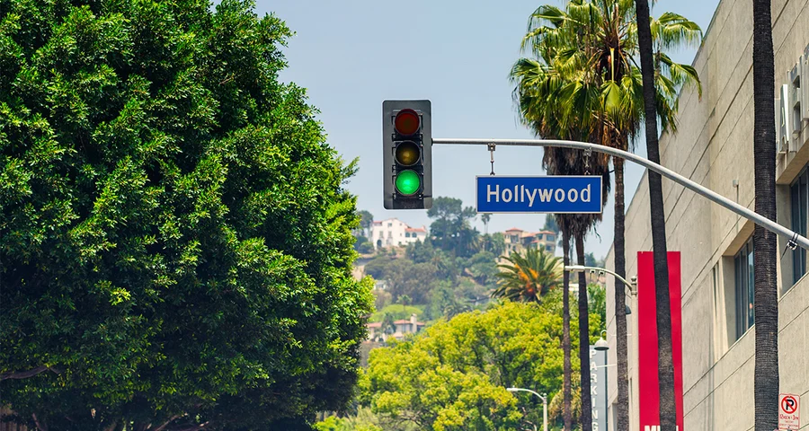 Hollywood Boulevard Street Sign with green traffic light