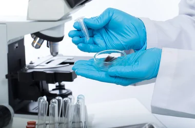 Lab tech testing hair for drugs