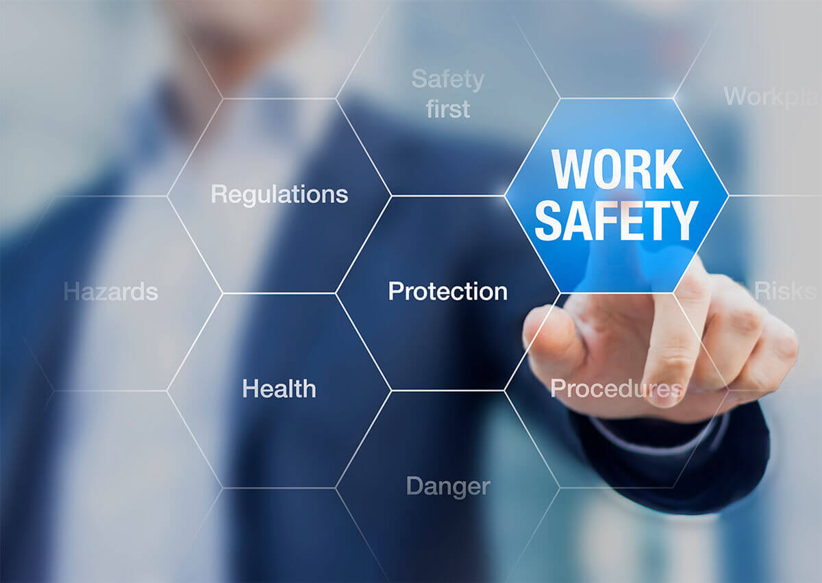 businessman selecting work safety icon