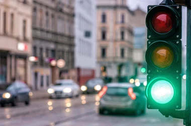 busy street with green traffic light