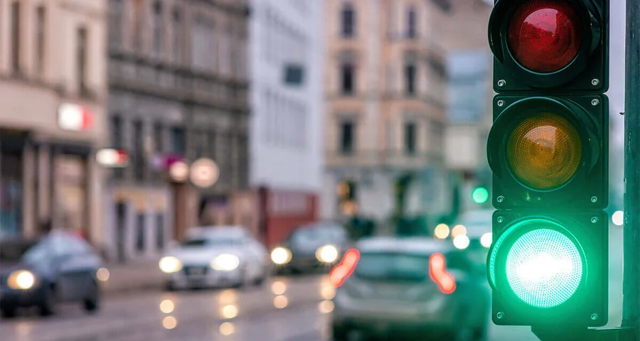 busy street with green traffic light