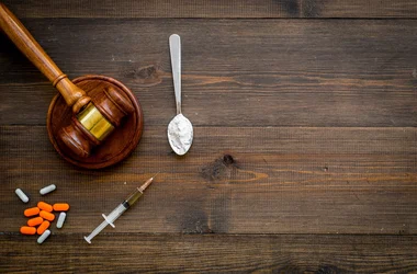 legal gavel and drugs pills needle injection