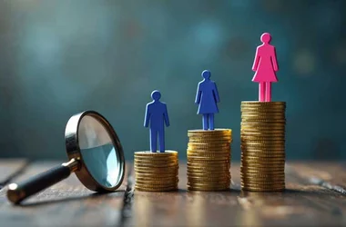 Concept photo illustrating gender pay gap. Figurines stand atop stacks of coins, woman on top, men below. Magnifying glass explores income disparity in business, finance, economics.
