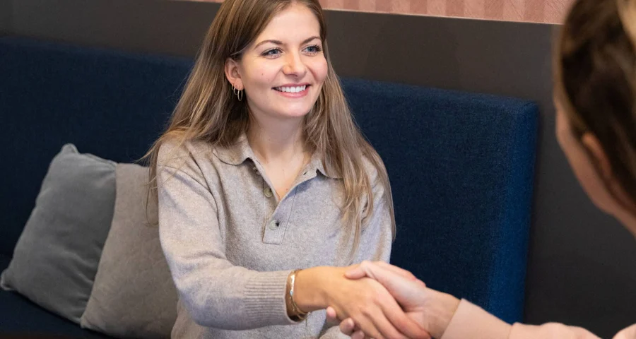 job candidate shaking interviewer's hand