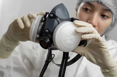 Nurse or doctor checking a mask respirator