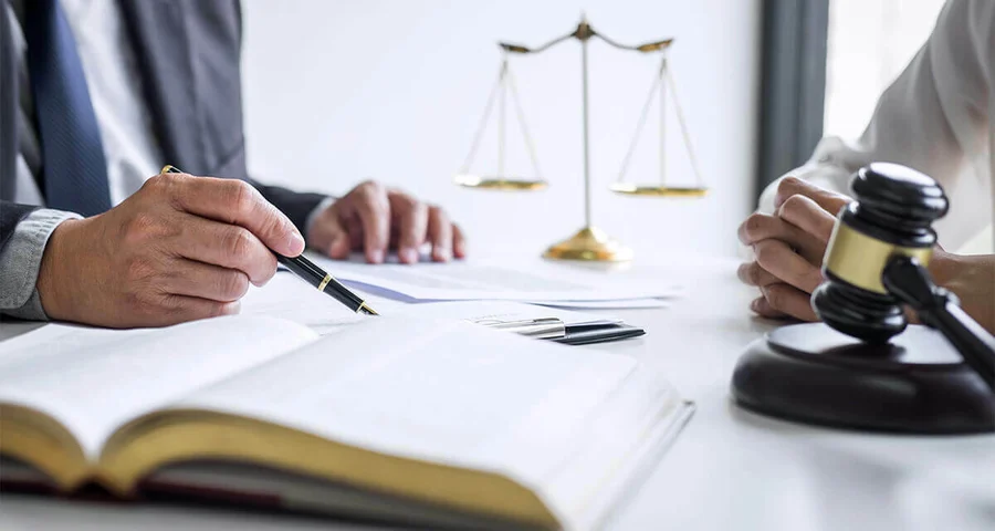 Legal Meeting gavel and scales of justice