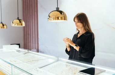 Female sale associate in an exclusive store