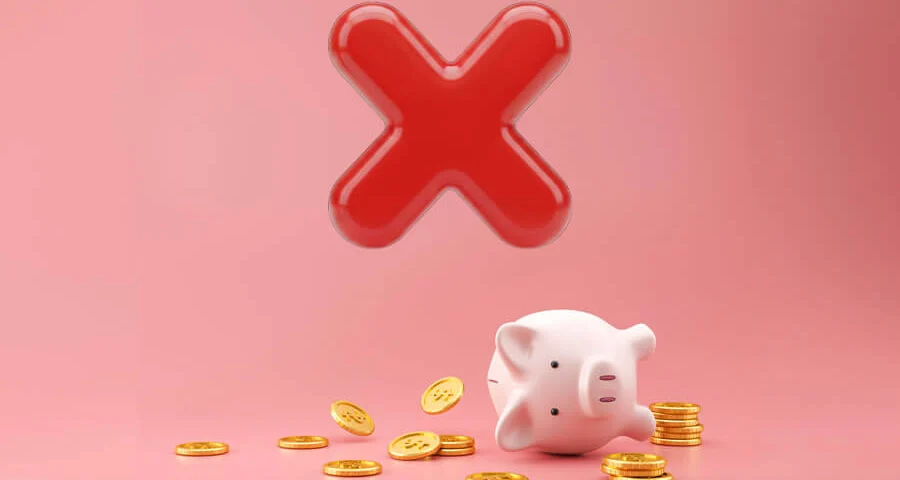 Downloaded Piggy bank and golden coins on pink background with lost money concept