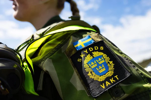 Sweden police officer with badge