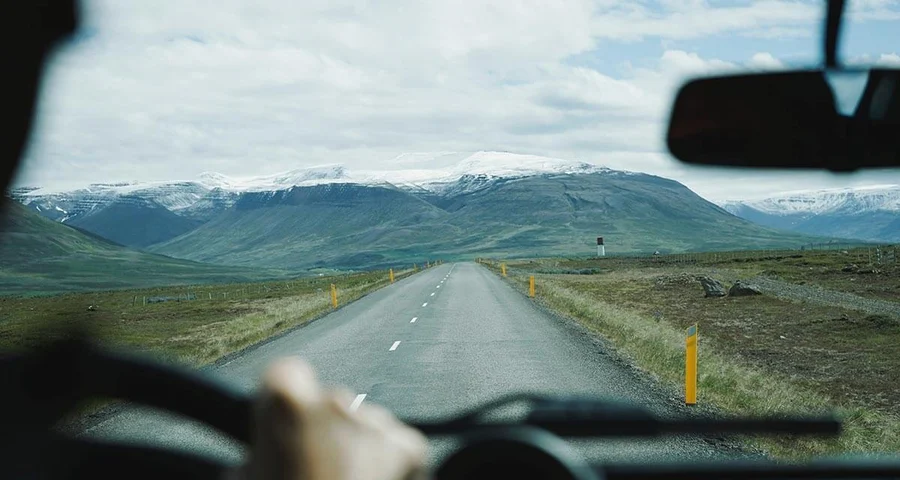 Truck driver Point of view driving into the mountains