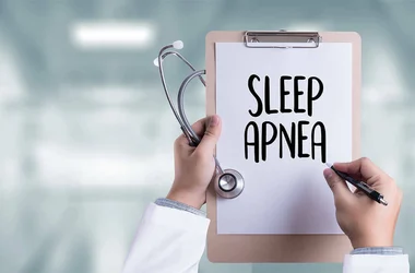 doctor diagnosing sleep apnea