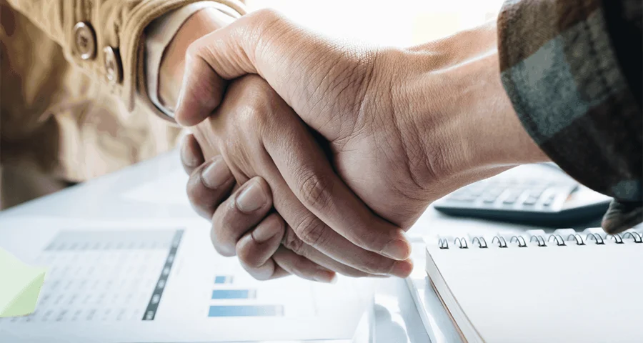 ODT Acquistion business agreement handshake